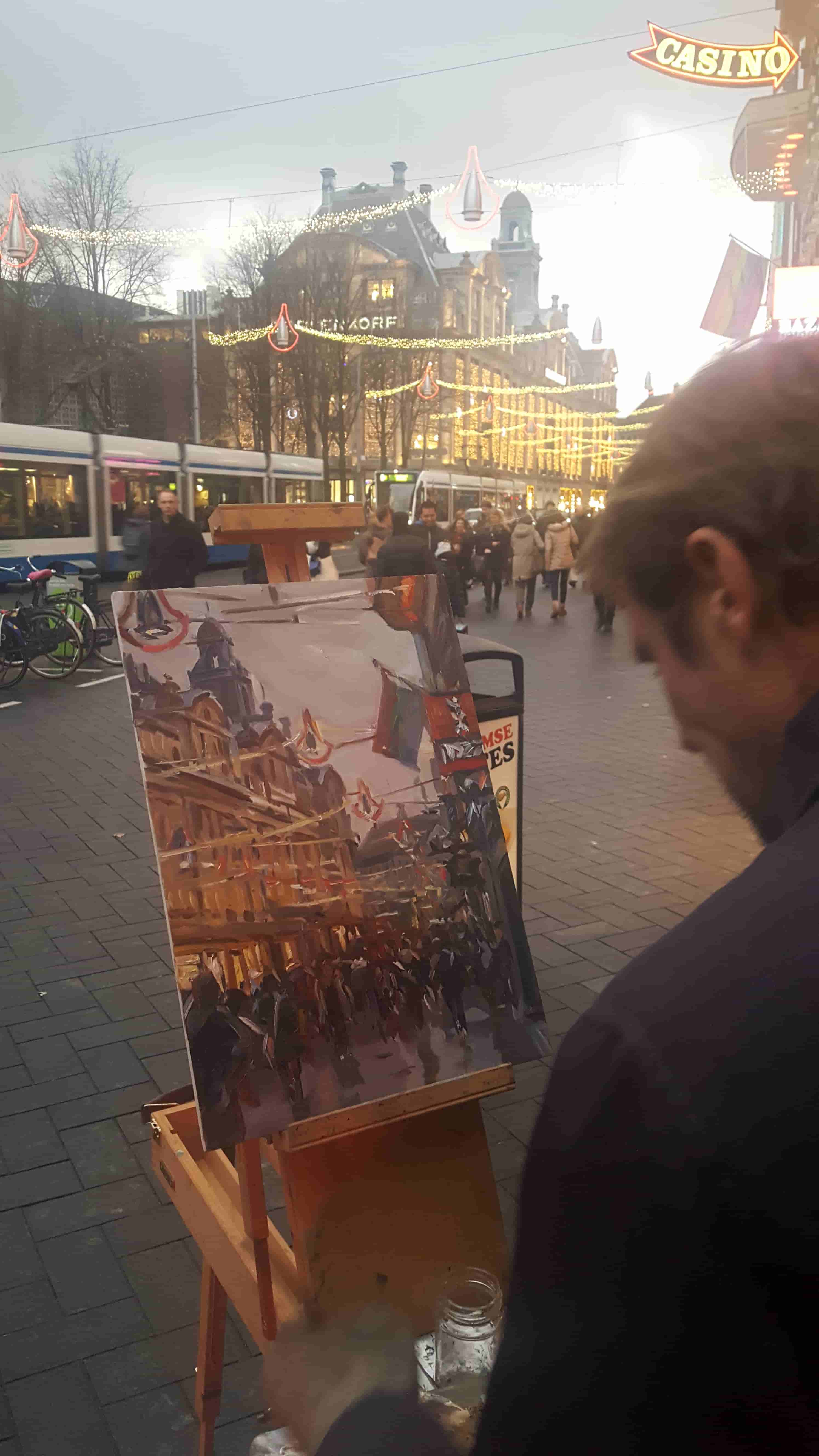 Hans Versfelt - Damrak bij avond (in het echt)