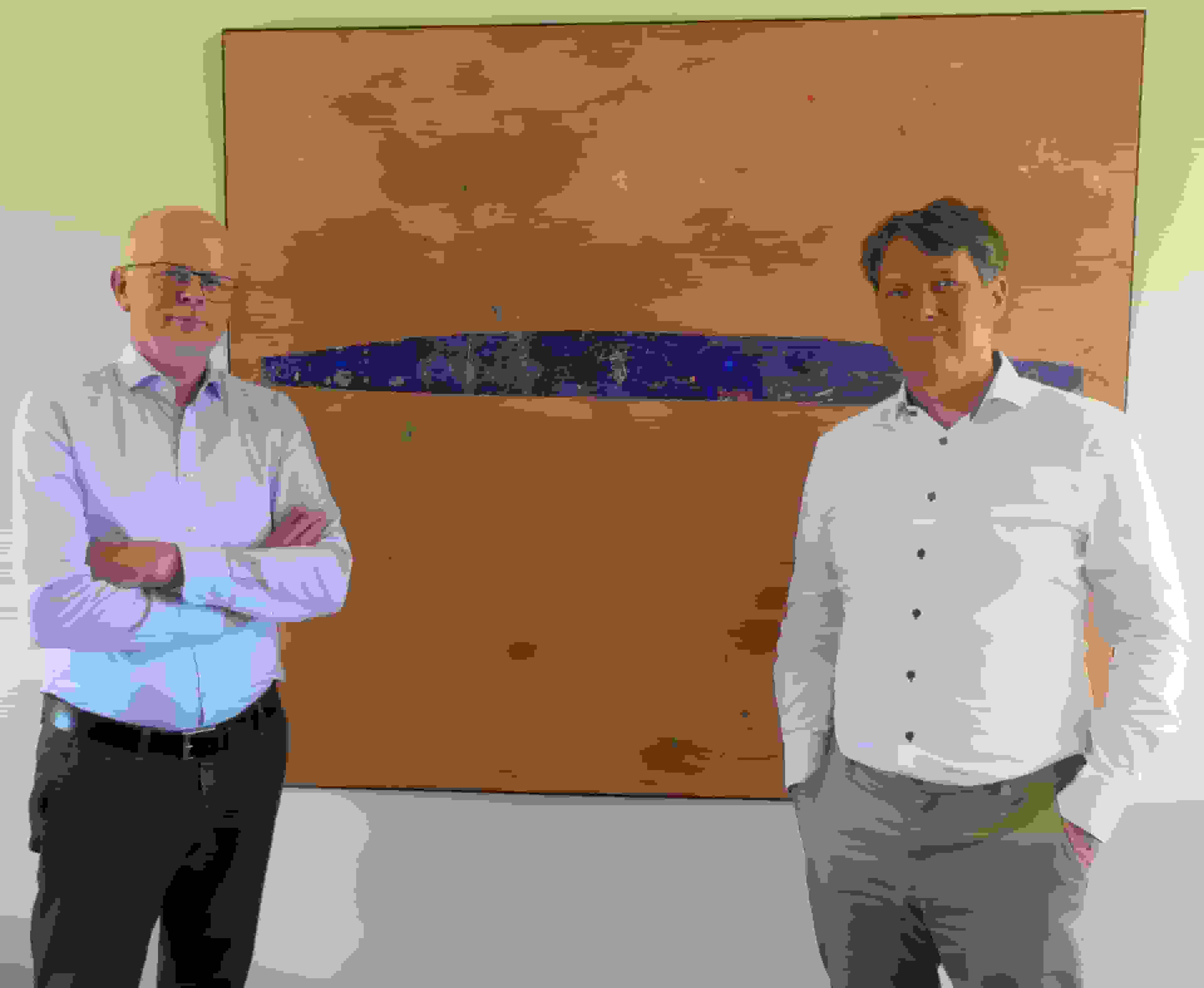 Hans Heintz en Bert Bruning bij de kamer van koophandel